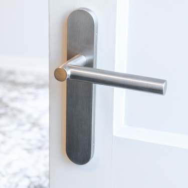 Grosetto deurklink RVS met afgerond schild